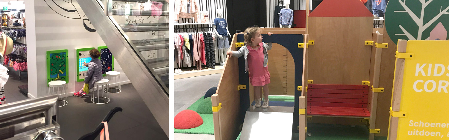 Kinderhoek als onderdeel van het winkelinterieur van een kledingwinkel